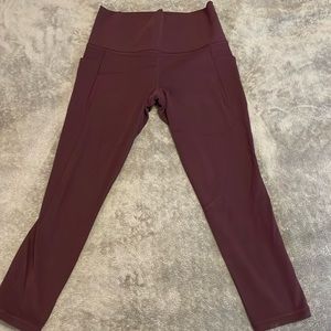 Athleta Salutation Stash Pocket II 7/8 Tight Legging
